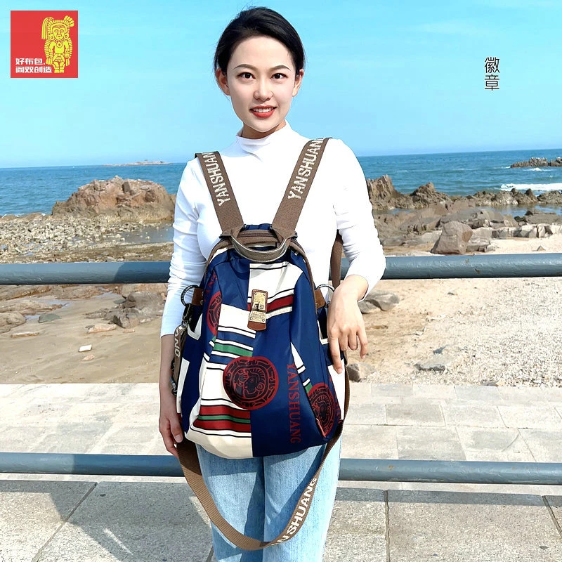 新款《阎双创造&徽章》原创正品休闲出游通勤百搭潮流双肩包