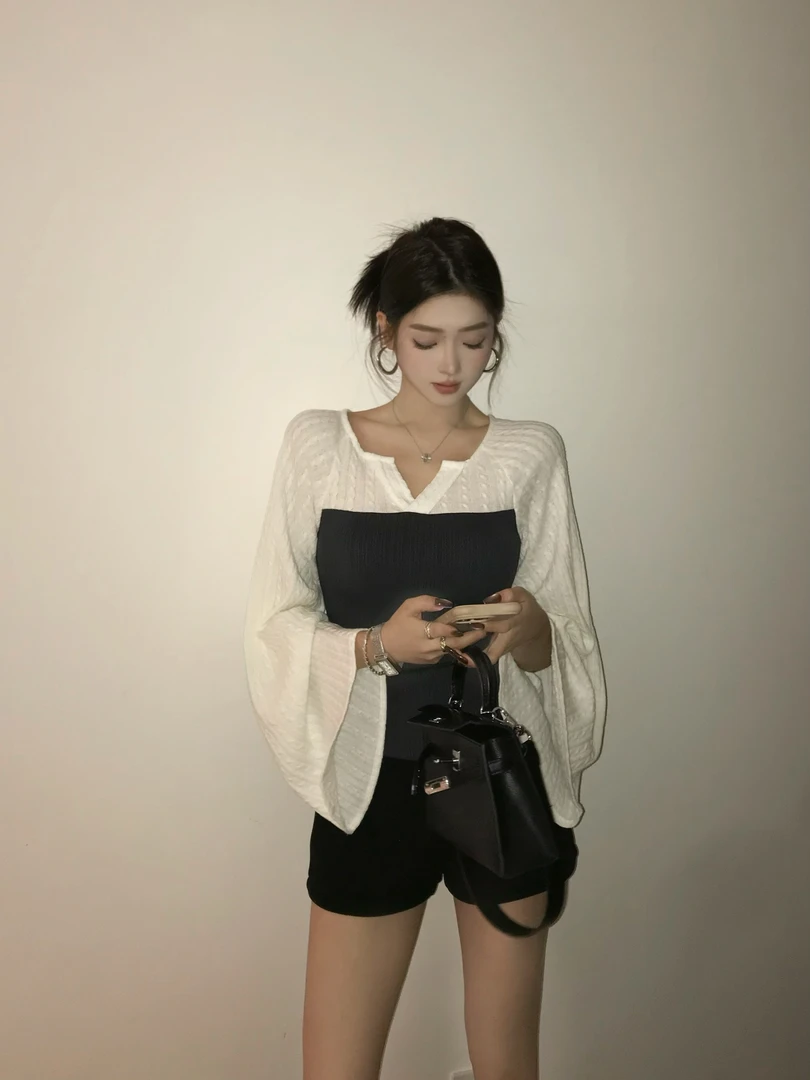 设计感迷人海腰风撞色温柔针织打底上衣 8267#