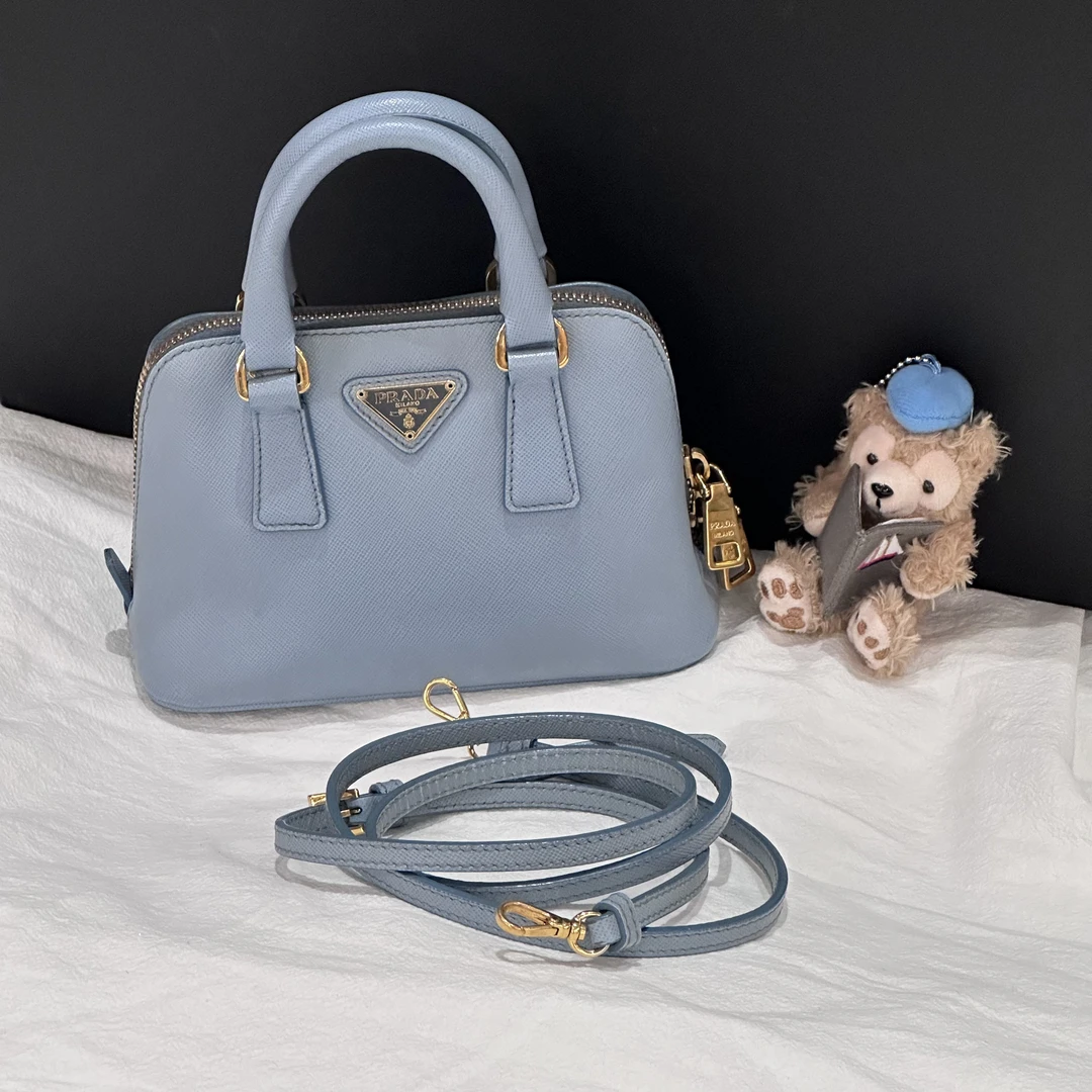 95新 Prada/普拉达 Prada mini贝壳包手提斜挎包天空蓝