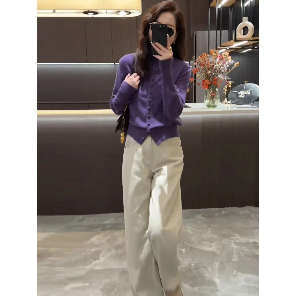 秋季时尚套装女2024新款设计感高领显瘦长袖针织衫+牛仔裤两件套