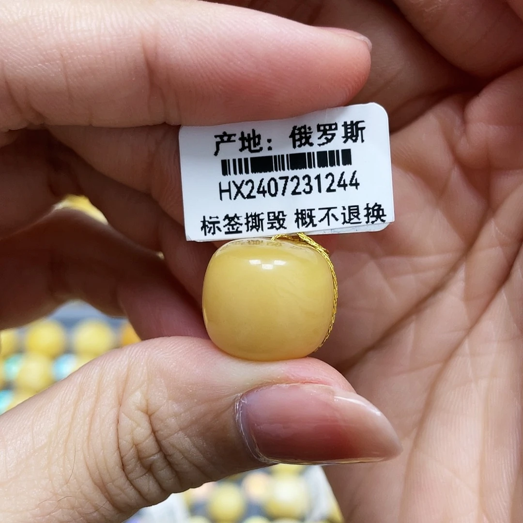 琥珀珠宝奇石未镶嵌15.7*14.1mm微微瑕花粉