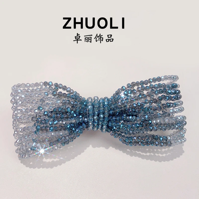 C232韩版新款水晶蝴蝶结弹簧夹