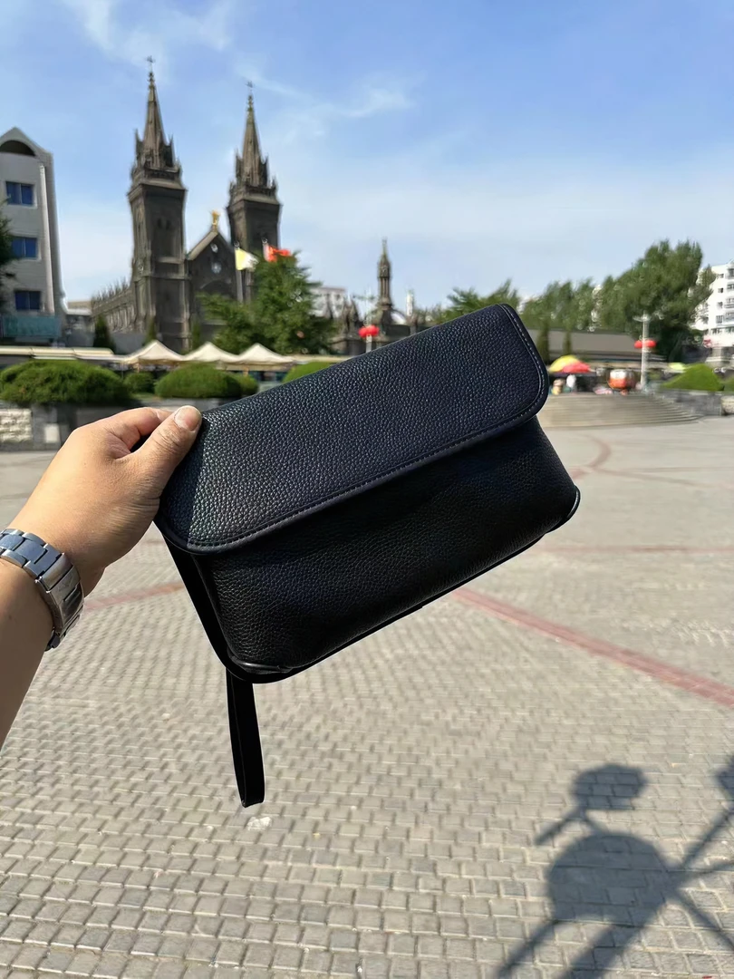 高品质男士新款多功能斜挎包真皮时尚百搭黑色潮流