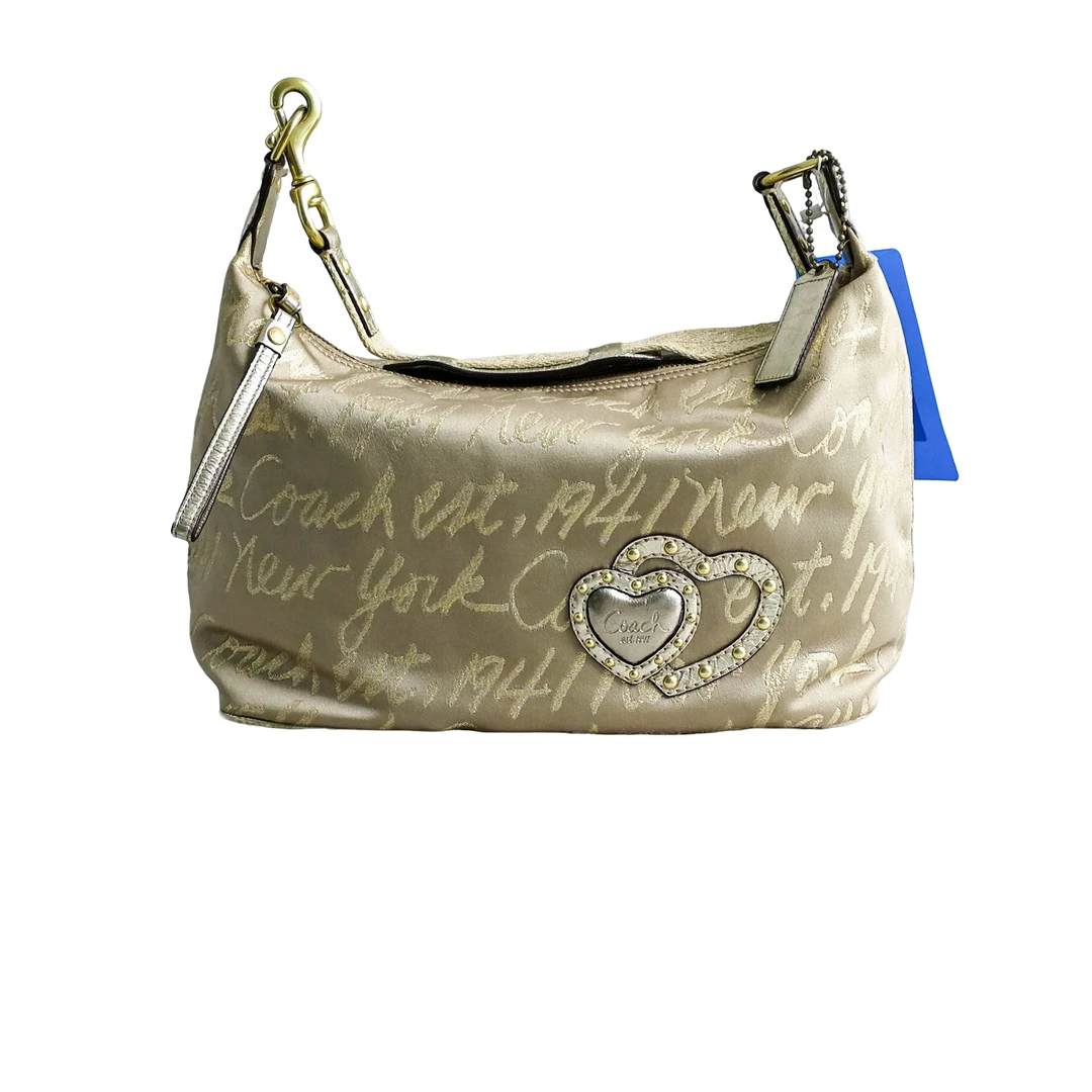 95新 COACH/蔻驰 coach 爱心印花腋下包 72429