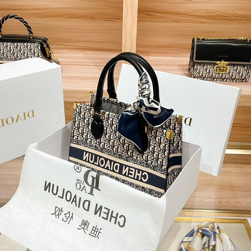 香港正品DIAOLUN大容量子母贝壳托特包女2022新款单肩斜跨手提包