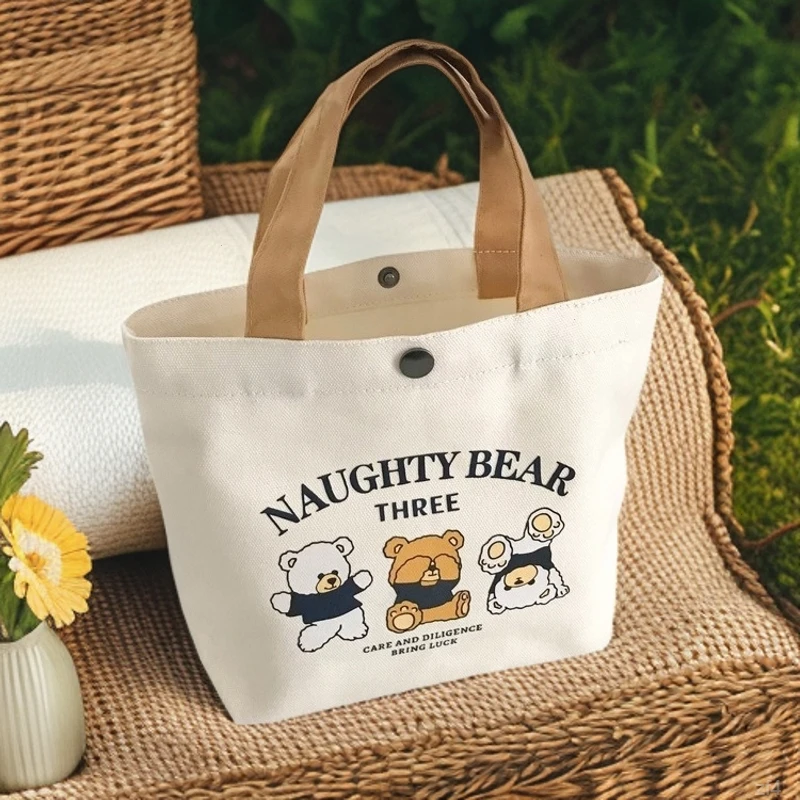 帆布包小巧卡通百搭手提包女学生饭盒袋简约手提袋子上班族