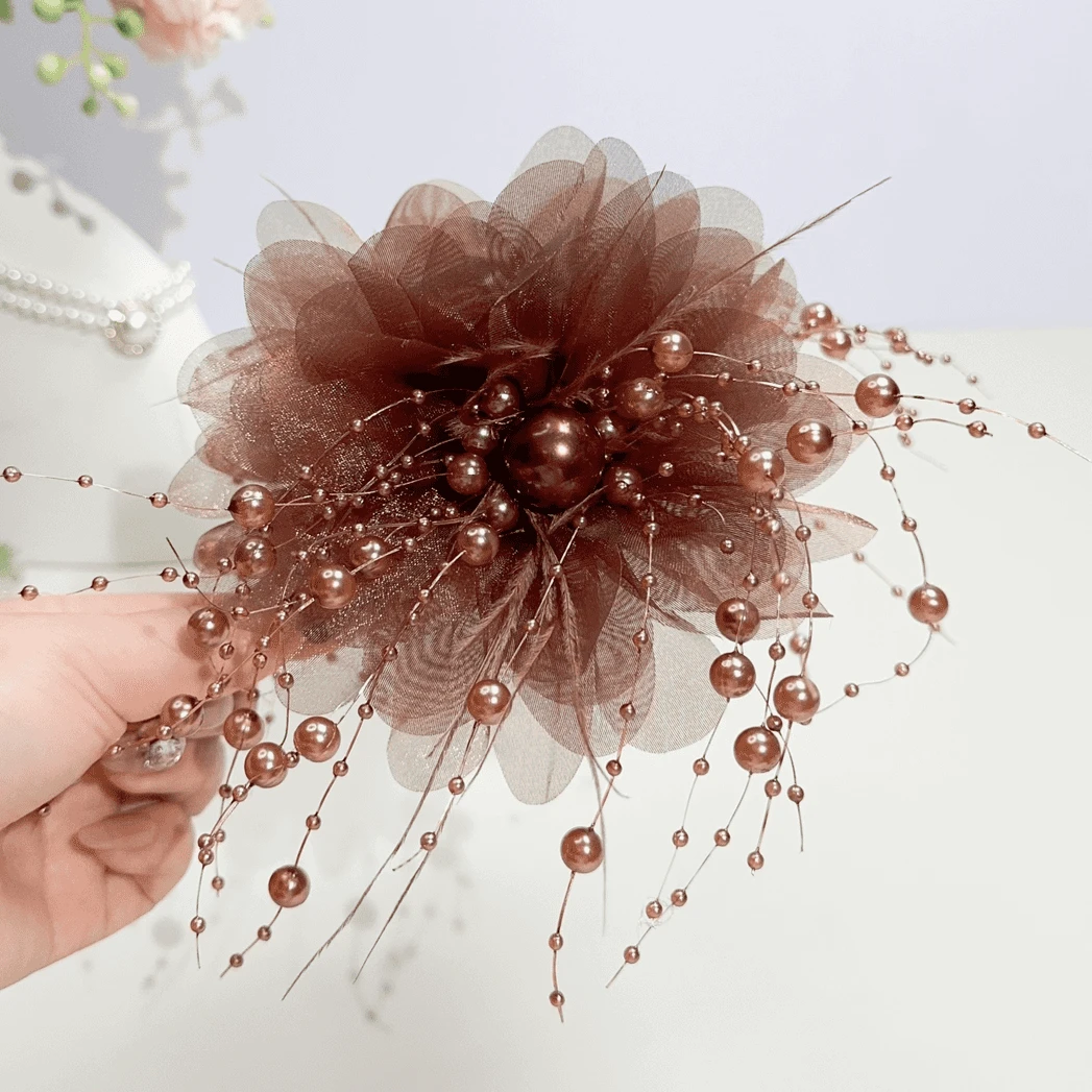 网红秋冬时尚2024新款羽毛抓夹女后脑勺超仙盘发抓夹鲨鱼夹子发饰