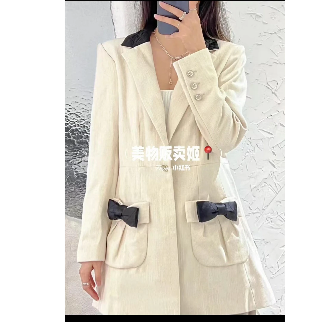 99新 Chanel/香奈儿 米色蝴蝶结中长款西装外套/36码/编号318