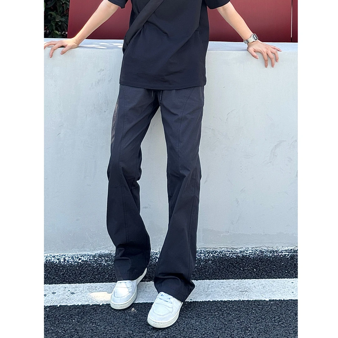 QUALCOMM基础斜切休闲裤男秋季新款黑色百搭微喇长裤显瘦显高裤子