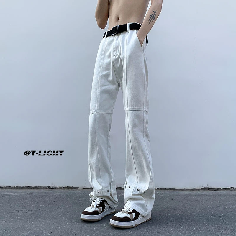 高街ins白色男士微喇牛仔裤潮牌小众显瘦百搭铆钉纽扣拼接男长裤