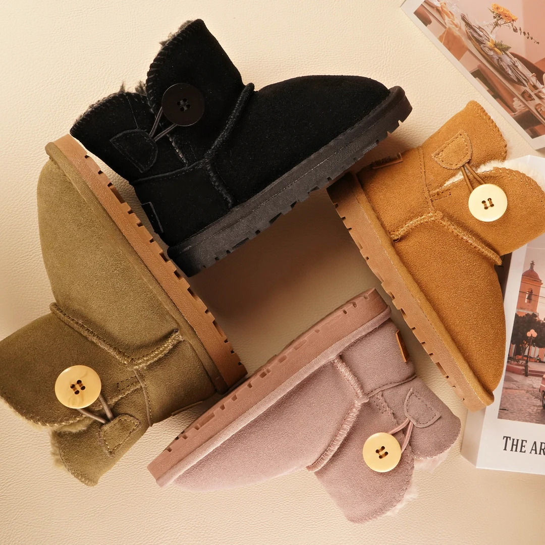 高档儿童冬款雪地靴纽扣款女童男童宝宝真皮软底防滑加厚保暖