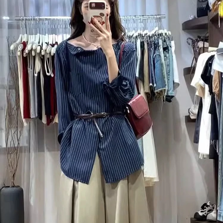 韩系一字肩蓝色条纹露肩上衣女春秋长袖设计感小众正肩开叉衬衫薄