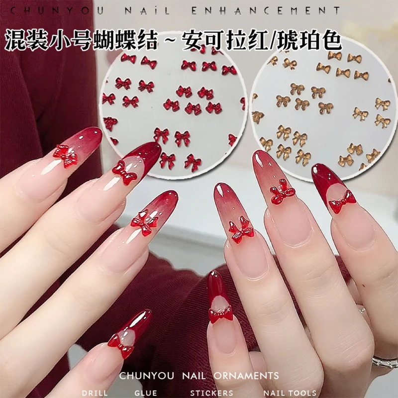 春柚美甲新款安可拉红蝴蝶结琥珀色美甲蝴蝶结高级流行美甲指甲钻