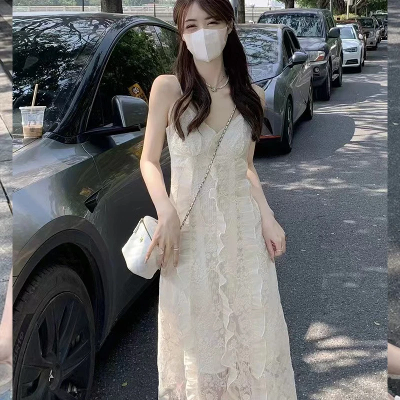 海边度假V领蕾丝吊带连衣裙女2024新款春季桔梗法式气质仙女长裙