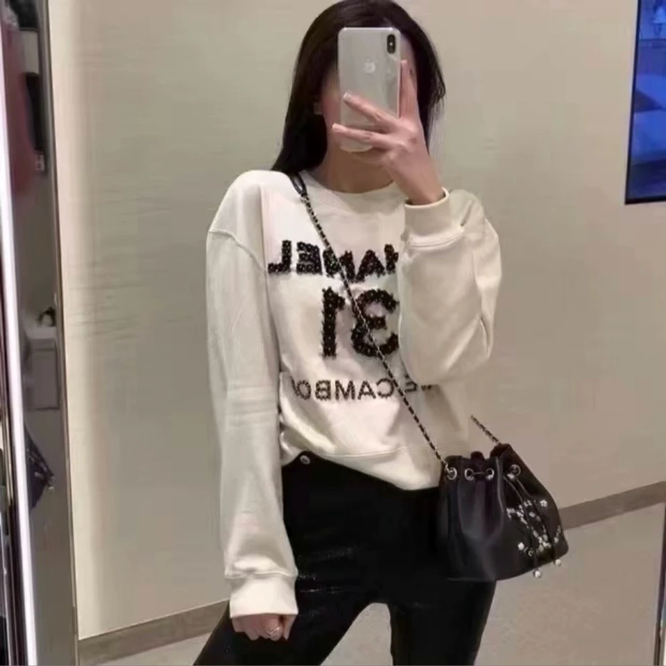 99新 Chanel/香奈儿 S码 20A康鹏街米白色 山茶花字母 长袖 卫衣