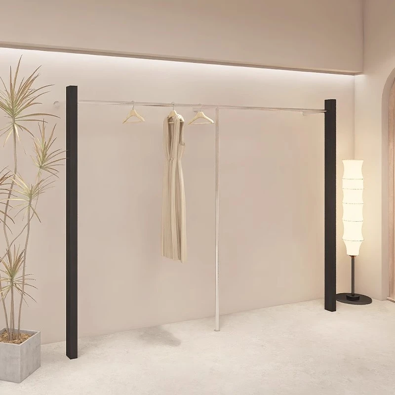 高档服装店哑光黑不锈钢上墙展示架陈列架男服装店挂衣架展示架