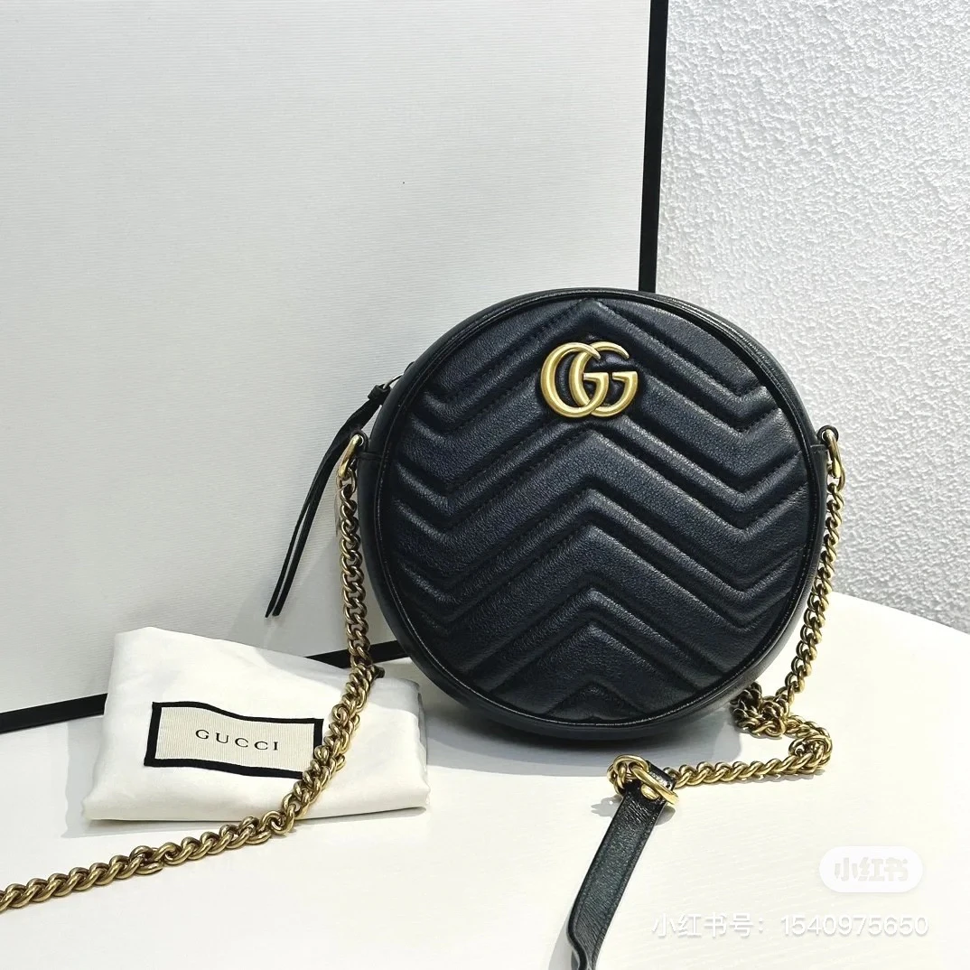 95新 GUCCI/古驰 古驰黑金圆饼斜挎包ym