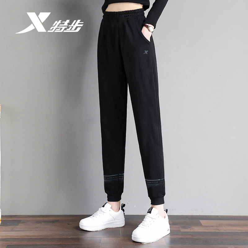 特步运动裤女秋季休闲束脚裤子官方正品针织女裤黑色卫裤女款清货