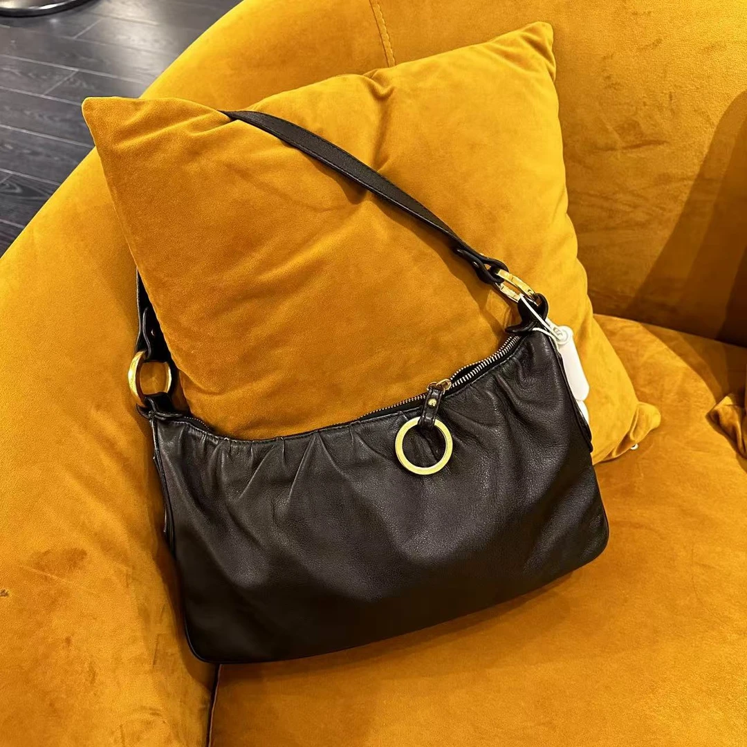 95新 FENDI/芬迪 GGS芬迪黑金牛皮腋下包/97514553