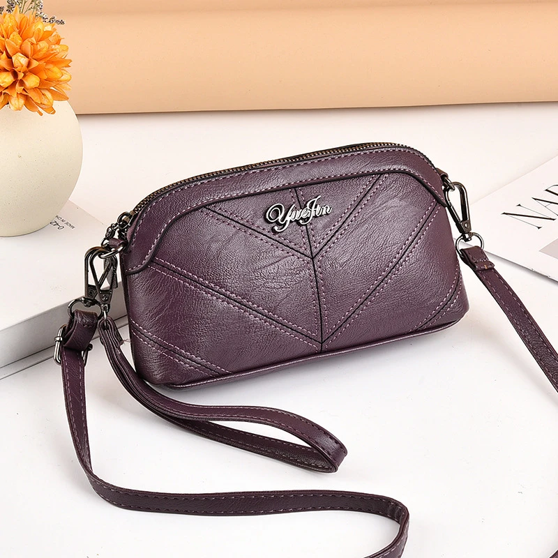 手拿包女妈妈款2025年新款春夏迷你手机包零钱包中老年女包斜挎包