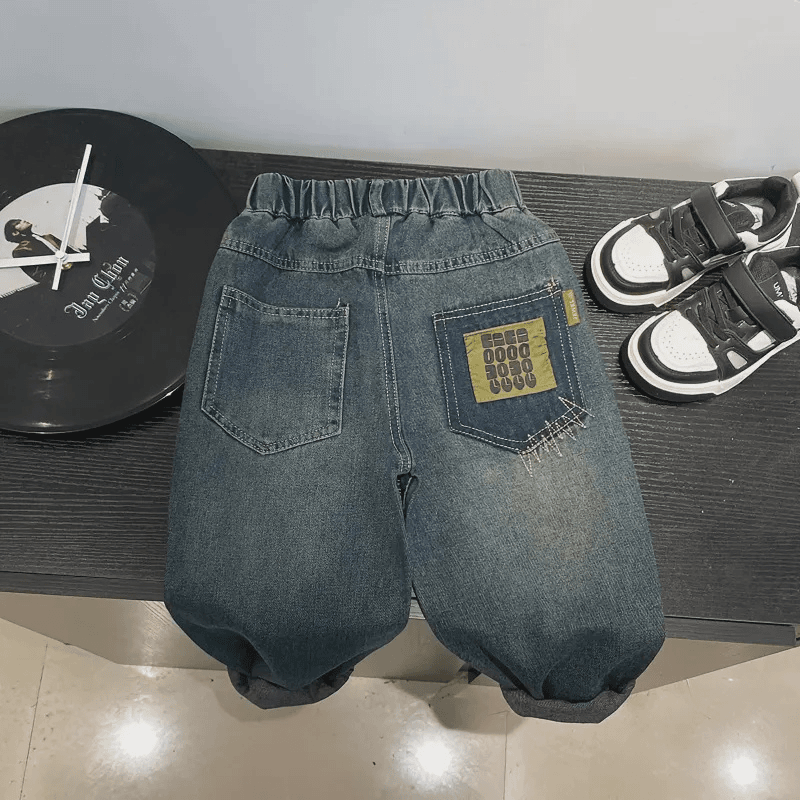 Q30秋季儿童新款后袋OOOO牛仔长裤