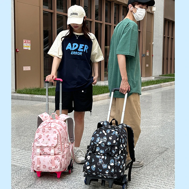 儿童拉杆包小学生时尚爬楼梯大容量轻便减负学生双肩背包拉背两用
