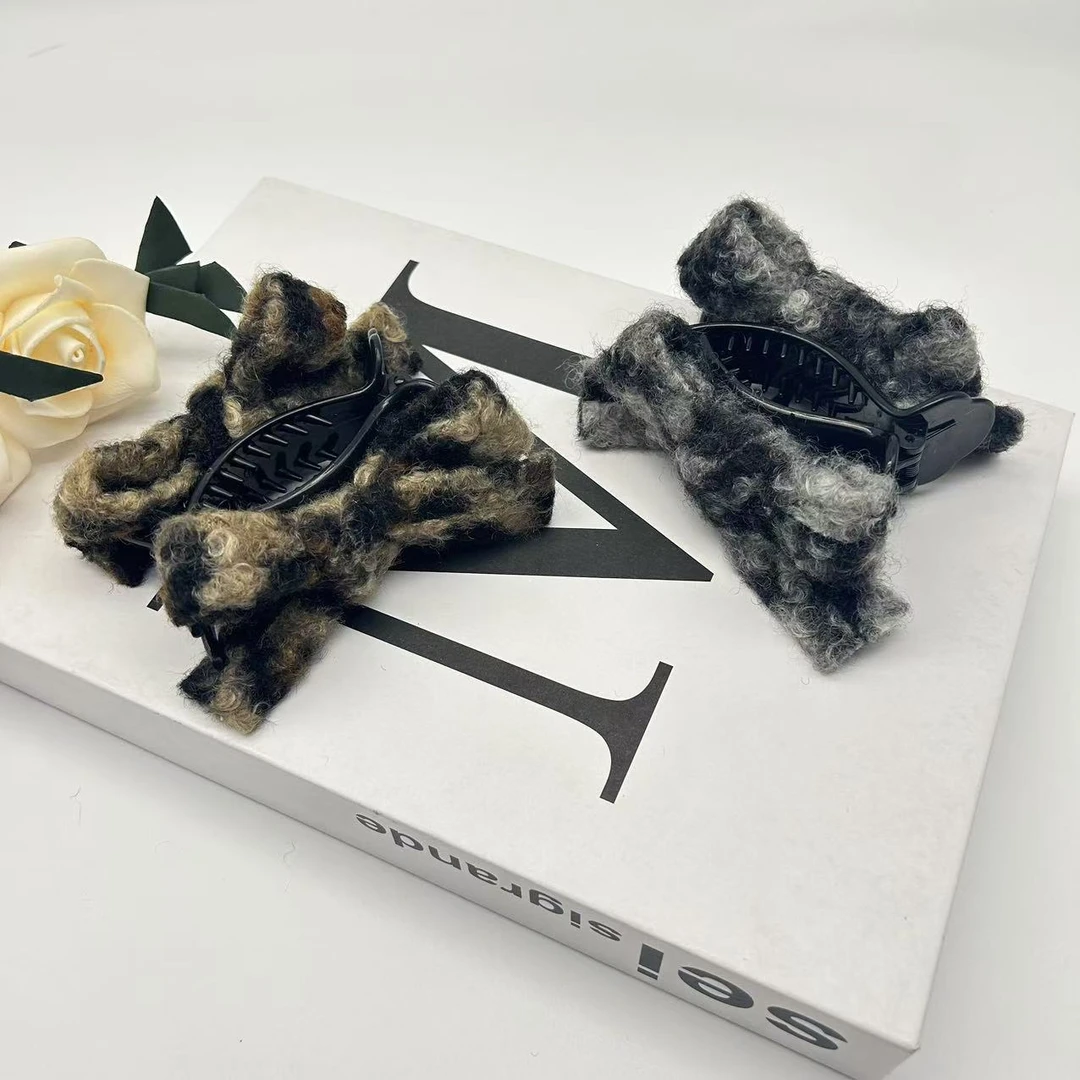 毛绒绒豹纹蝴蝶结丸子头抓夹秋冬新款半扎发固定夹后脑勺抓夹