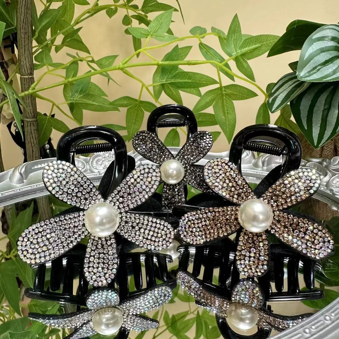 轻奢简约太阳花抓夹女盘发后脑勺发夹满钻花朵鲨鱼夹优雅