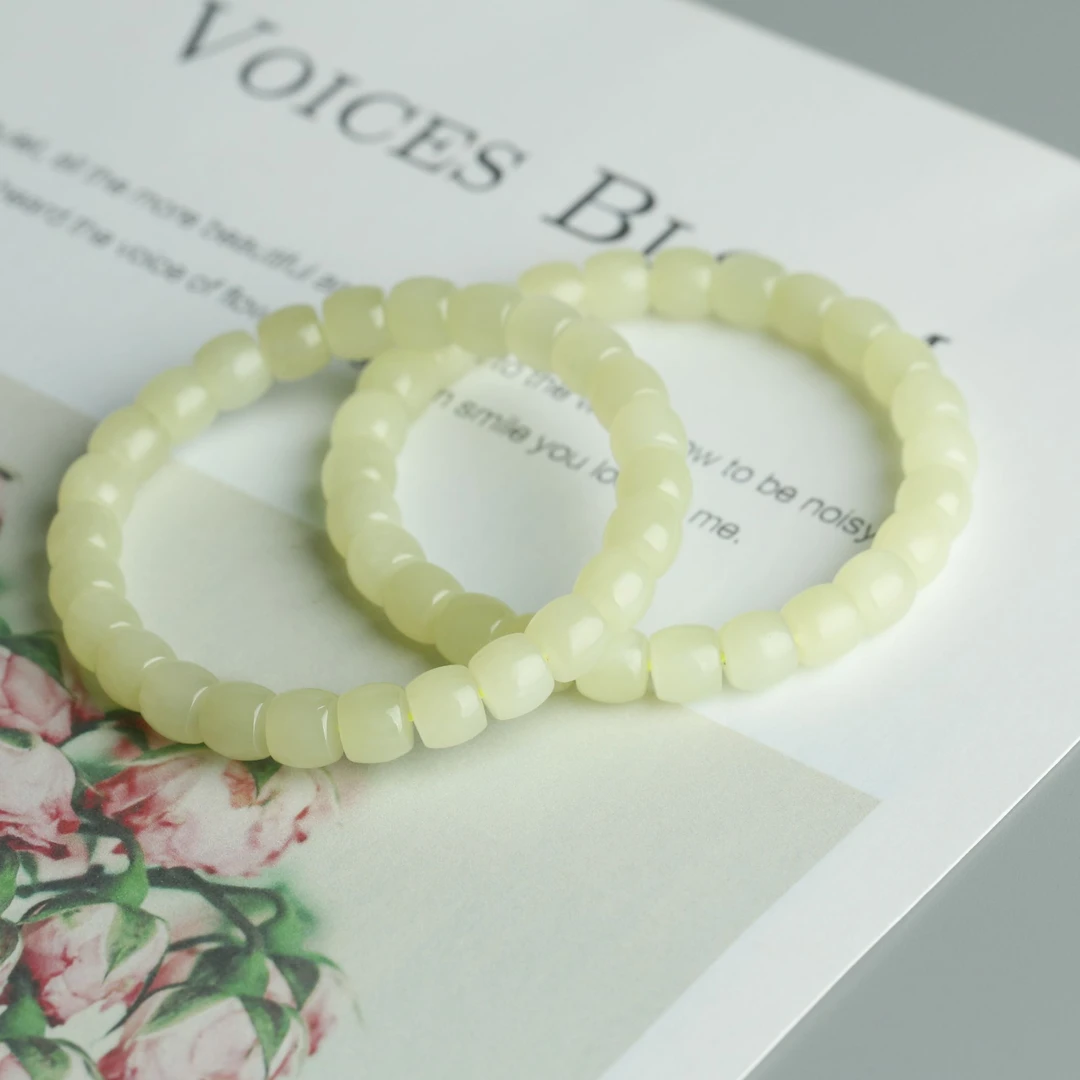 （玉说珠宝）天然新疆和田玉若羌黄口8X7MM桶珠手串多样性发其一