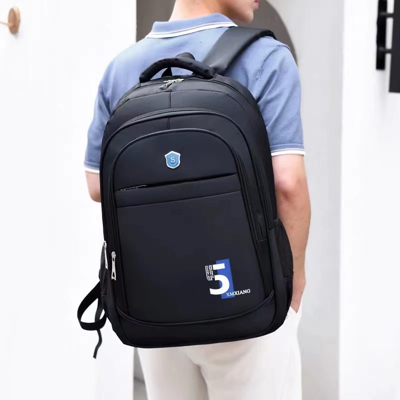 简约双肩男士黑色电脑包韩版商务大容量通勤双肩包休闲中学生