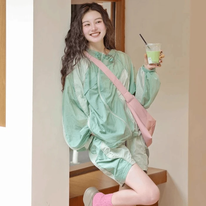夏装2024新款高级感小洋装薄荷曼波风绿色拼接连帽防晒两件套装裤