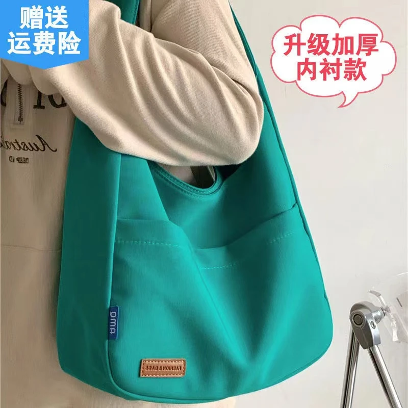 大容量托特包包女2022新款森系简约纯色手拎包学生上课单肩帆布包
