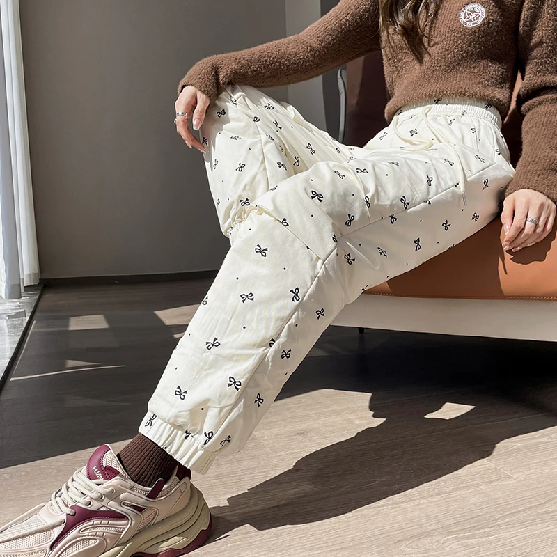 米白色束脚羽绒裤女2025新款外穿冬季加绒防寒保暖时尚白鸭绒棉裤