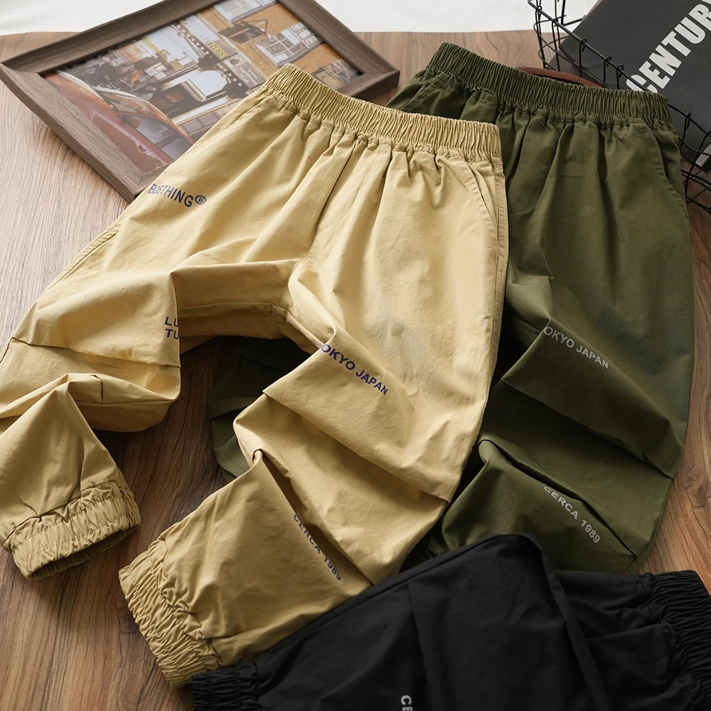 儿童男童春秋新款字母印花拼接工装裤中大童休闲长裤洋气裤子