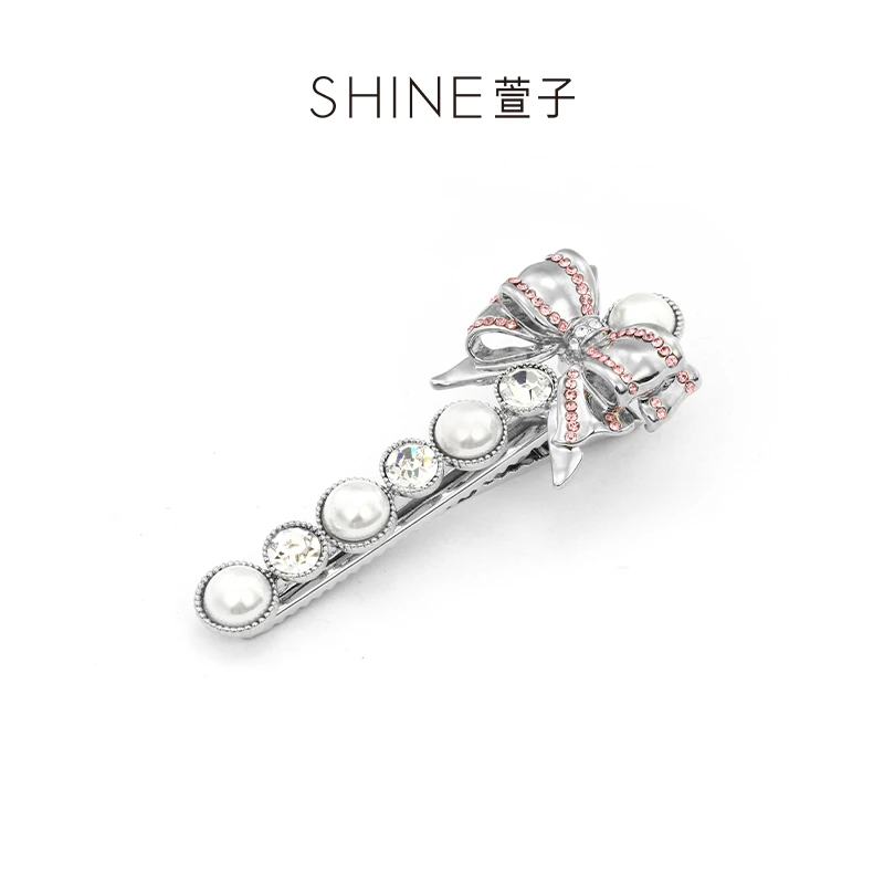 萱子【商场同款】爱情神话系列粉红蝴蝶结边夹