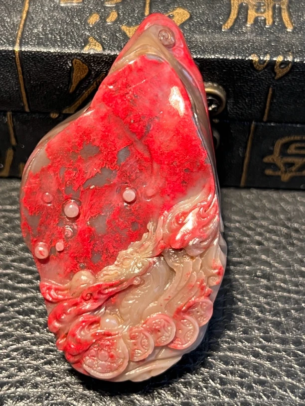 昌化大红袍牛角冻鸡血手把件