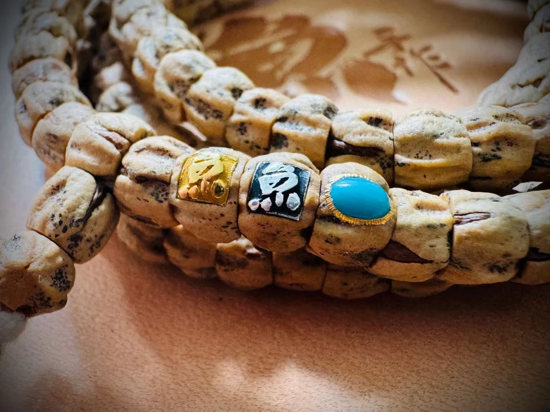 [花有鱼文玩]鱼标金银标系列百香大肠百香籽