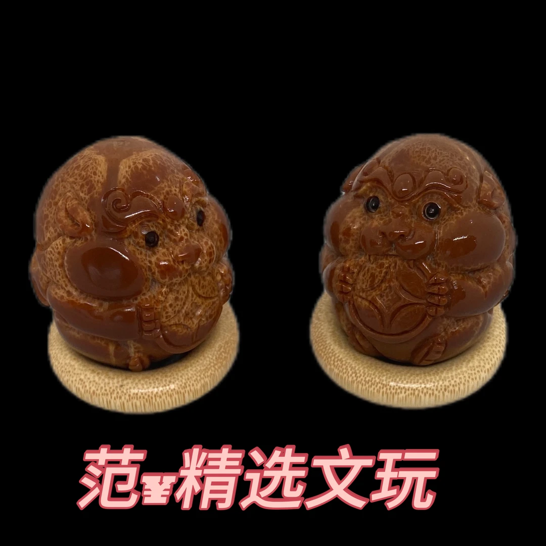 吞金兽手把件巴西大橄榄