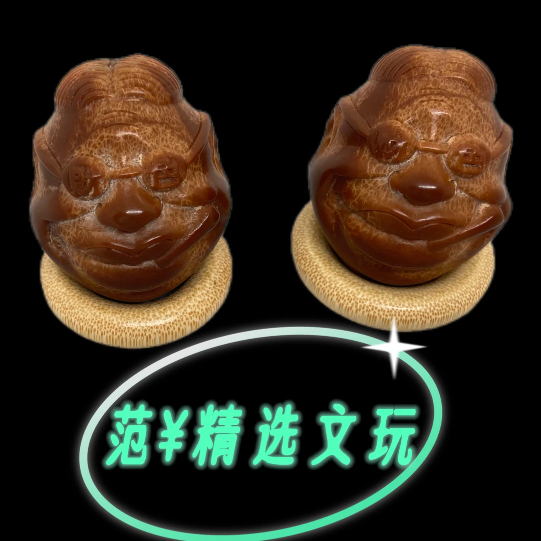 大亨财色双收手把件——橄榄文玩