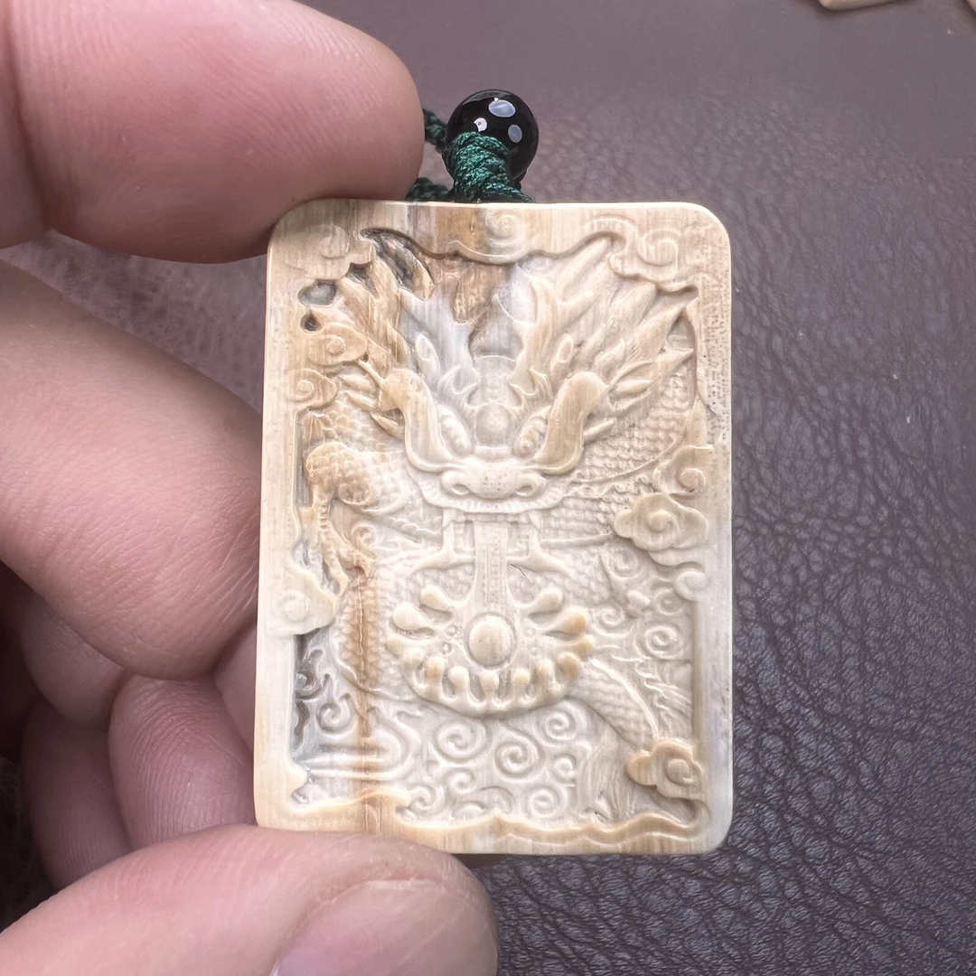 F-67-保真精工猛犸牙手雕龙牌
