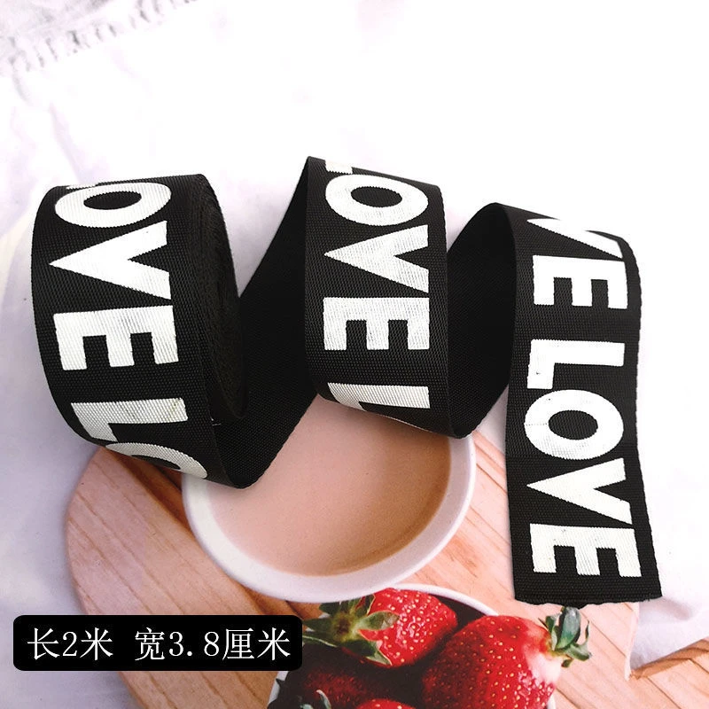 黑色螺纹白字母LOVE服装辅料鞋帽装饰印染高密度丝带无弹力布飘带