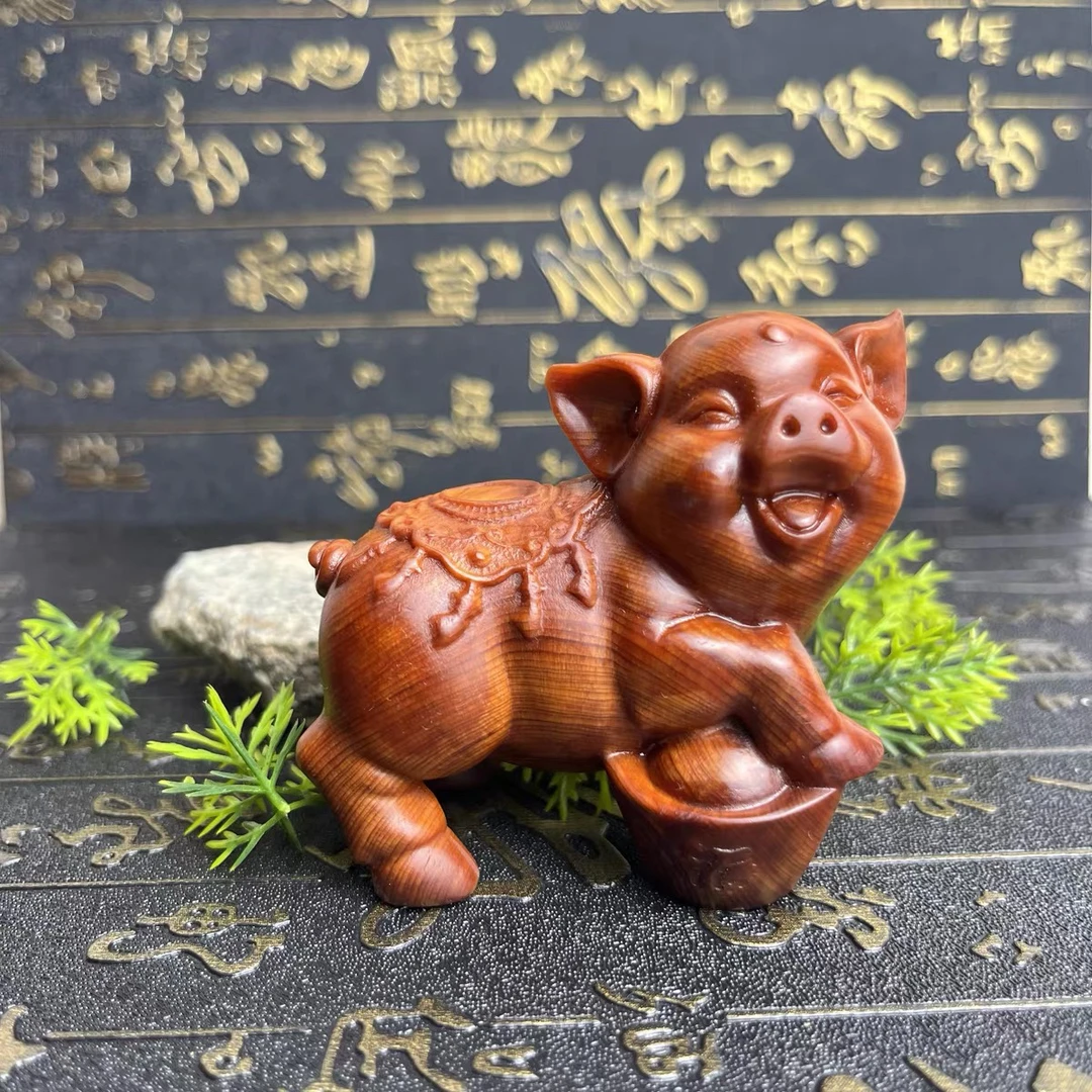 崖柏高油老料踩元宝猪手把件创意文玩实木雕刻工艺礼品摆饰福猪生