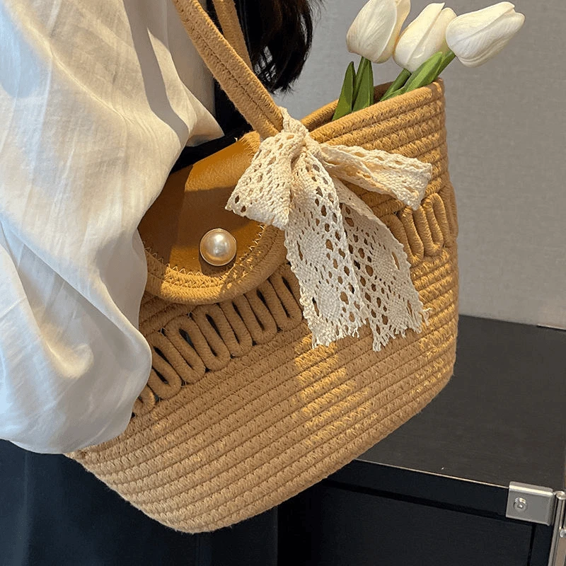 包包小众法式温柔高颜值手提女学生大容量编织草编单肩托特水桶包