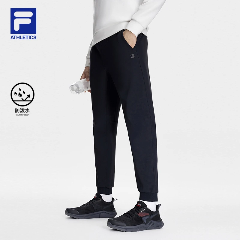 Fila/斐乐男子加厚加绒防泼水束脚裤秋冬保暖运动长裤A11M341612F