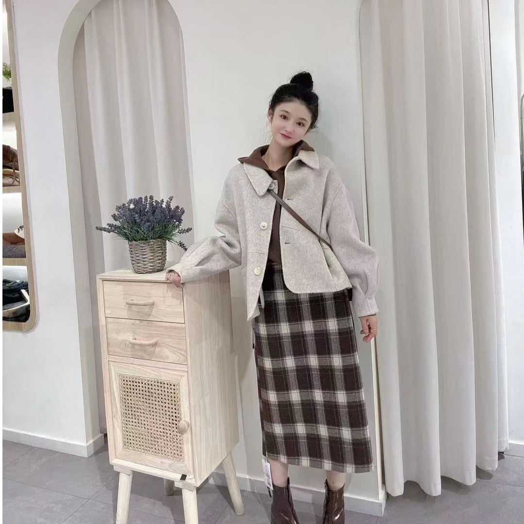 絜潔牌新款时尚大衣