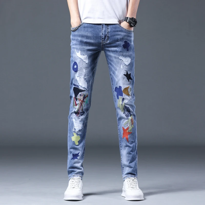 559个性刺绣士潮牌弹修身小脚裤补丁破洞长裤子男牛仔裤男款男士