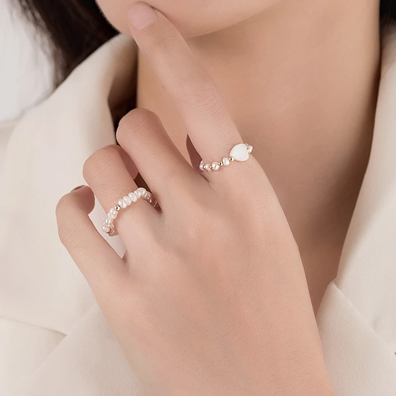 金美澳 铜合金仿珍珠戒指 小众爱心时尚个性简约弹力食指戒2025年