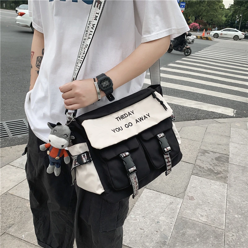 ins潮牌单肩包男士时尚潮流大容量斜挎包女休闲日系学生邮差背包
