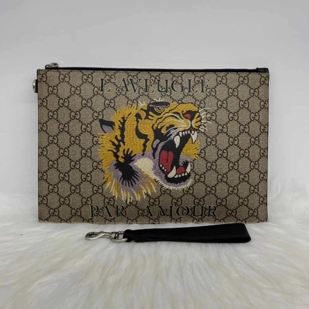 95新 GUCCI/古驰 铭音奢品97/GUCCI古驰刺绣虎头手拿包/男士1421