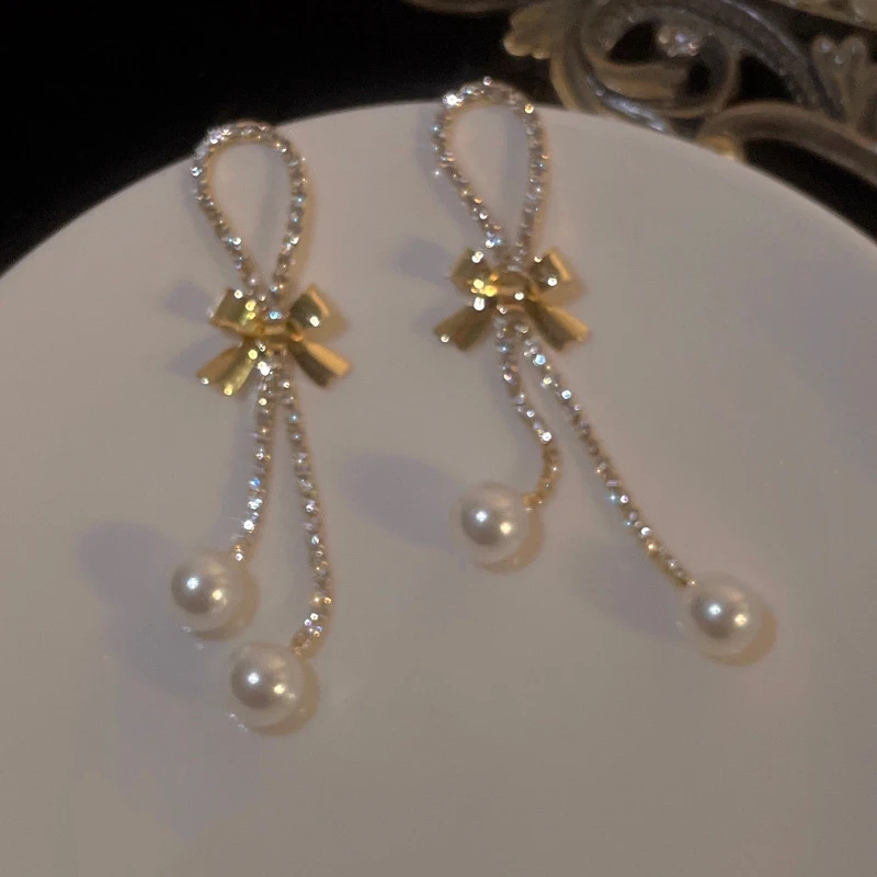 铜合金合成锆石耳饰 美貌聚焦~氛围感蝴蝶结流苏耳环网红温柔小众